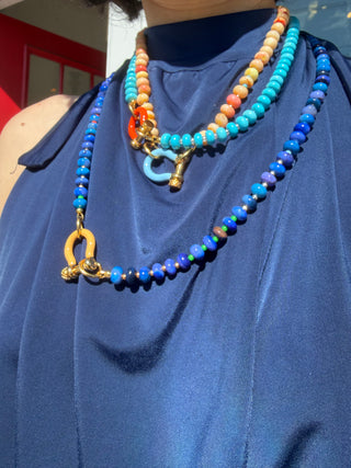 spicy dan, spicy dan jewelry, beaded necklaces, bold, colorful, model wearing navy blue and wearing three spicy dan necklaces