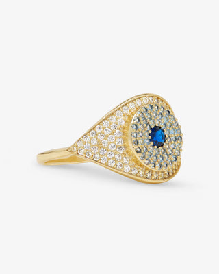 at house of 29 the model is wearing a blue evil eye ring with gold and sapphires