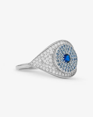 at house of 29 the model is wearing a blue evil eye ring with silver and sapphires