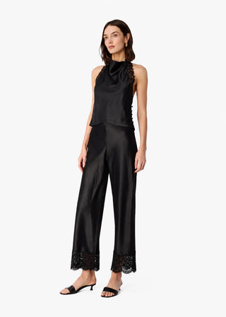 Cami NYC Bristol Mid Rise Lace Pant Black. Model is wearing the product and image is shot on white background. 
