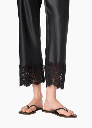 Cami NYC Bristol Mid Rise Lace Pant Black. Lower half of the pants are shot up close on white background. 