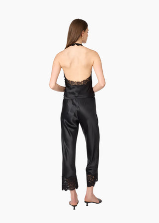 Cami NYC Bristol Mid Rise Lace Pant Black. Model's back is to the camera and image is shot on white background. 