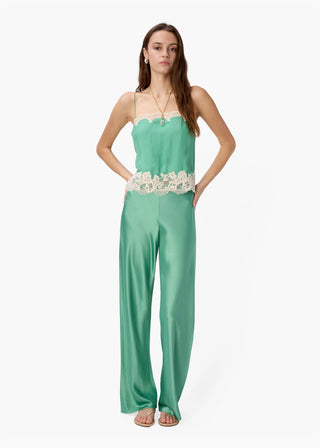 Cami NYC Bristol Mid Rise Pant Meadow. Model is wearing pants shot on white background. 