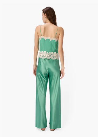 Cami NYC Bristol Mid Rise Pant Meadow. Model is wearing the pants and is turned around shot on a white background. 