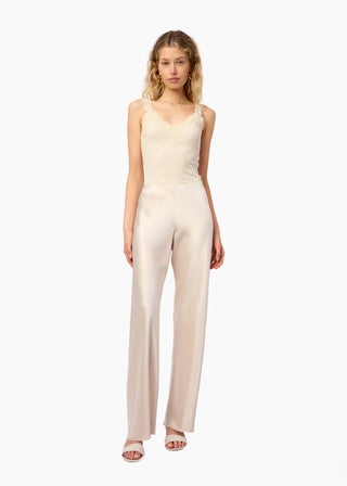 Cami NYC Bristol Mid Rise Pant Oat. Model is wearing the pants and image is shot on white background. 