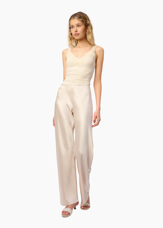 Cami NYC Bristol Mid Rise Pant Oat. Model is wearing pants and image is shot on white background. 
