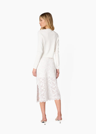 Cami NYC Jessa Cardigan White. Model is turned around posing shot on a white background. 