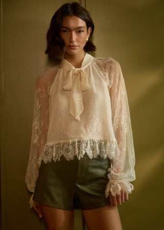 Cami NYC Tully Lace Blouse Oat. Model is wearing product. 