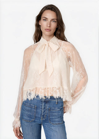Cami NYC Tully Lace Blouse Oat. Model is wearing product. 