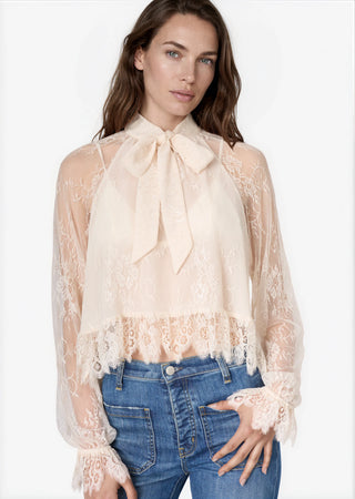 Cami NYC Tully Lace Blouse Oat. Model is wearing product. 