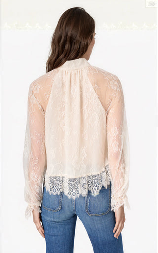 Cami NYC Tully Lace Blouse Oat. Model is wearing product.