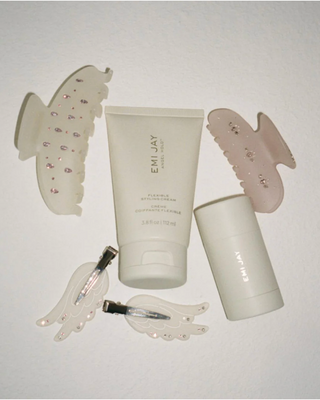 Emi Jay Big Effing Claw Clip in Morning Angel. Hair clip displayed with other Emi Jay products.