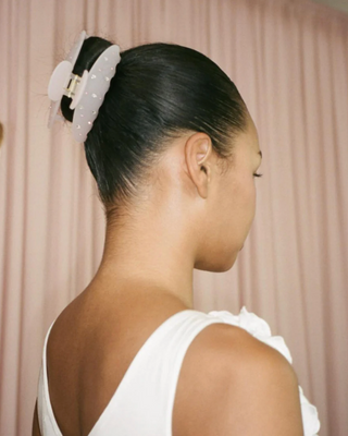 Emi Jay Big Effing Claw Clip in Twilight Angel. Model wearing the hair clip. 