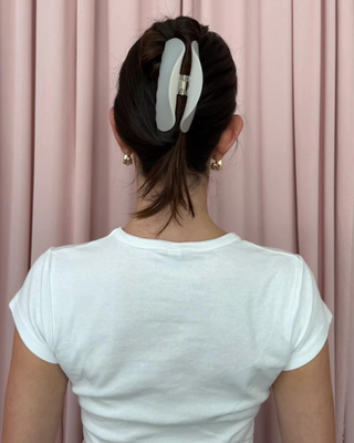 Emi Jay Half Moon Clip in Grey Smoke. Model wearing hair clip. 