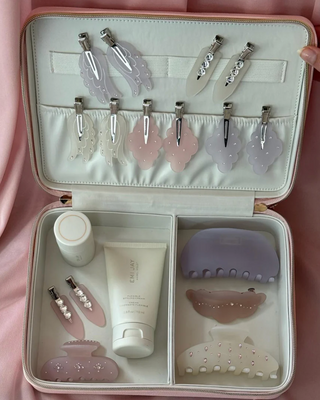 Emi Jay Half Moon Clip in Lilac Smoke. Product shown in a box with other Emi Jay products.