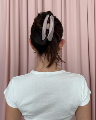 Emi Jay Half Moon Clip in Pink Smoke. Model wearing the hair clip. 