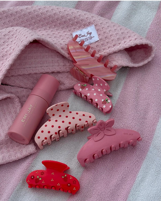 Emi Jay Heavenly Hair Towel Lychee Baby.  Towel displayed with other Emi Jay products.