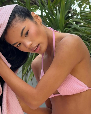 Emi Jay Heavenly Hair Towel Lychee Baby. Model is using the towel.