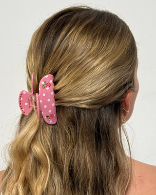 Emi Jay Sweetheart Hair Clip in Lychee Berry Dot. Model wearing hair clip in her hair.