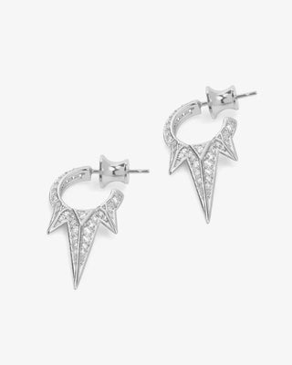 Side view of silver triple spike earrings showing curved hoop and detailed pavé setting