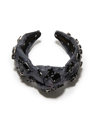 Crystal-embellished black headband with a signature knot design and playful candy-inspired gems.