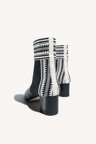 Amambaih Lola Ivory and Black ankle boots, Amambaih ankle boots, amambaih black boots, boots and booties, ankle boots, ivory boots, fall shoes, accessories, shoes, amambaih, going out shoes, comfortable shoes, heels