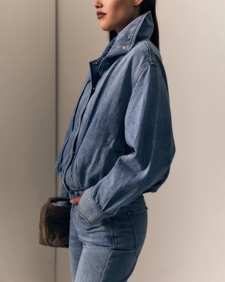 Le Jean Bubble Jacket. Model is posing in jacket. 
