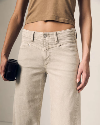 Le Jean Selena Crop Cuffed Mid Rise. Model is wearing the product and it is zoomed in.