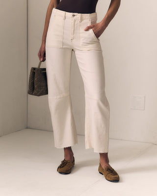 Le Jean Utility Soft Barrel. Model is wearing the product and has her hand in her pocket. 