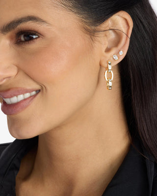Melinda Maria Ashley Chain Convertible Earring Gold. Model is wearing the product. 