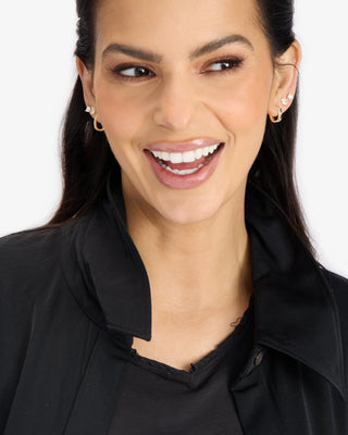 Melinda Maria Ashley Chain Convertible Earring Gold. Model is wearing the product. 