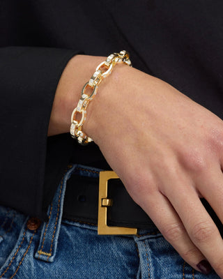 Melinda Maria Ashley Chain Link Bracelet. Model is wearing product.