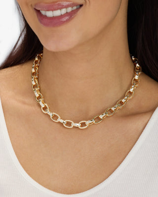 Melinda Maria Ashley Chain Link Necklace 9mm Gold White. Model is wearing product.