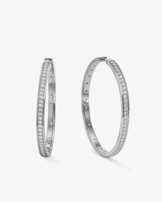 Melinda Maria Ashley Infinity Reversible Hoops 2". Product is shot on white background. 
