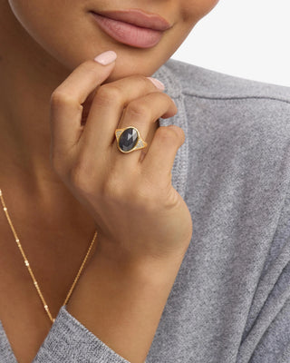 Melinda Maria David Ring Gold Labradorite. Model is wearing ring. 