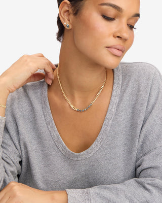 Melinda Maria Julian Loves Labradorite Necklace 5mm. Model is wearing the necklace.