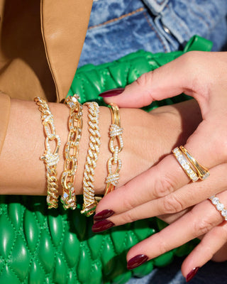 Melinda Maria Knot Cuff. Product is on model's wrist. 