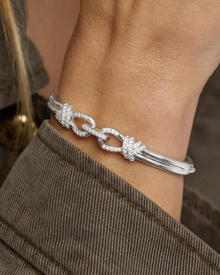 Melinda Maria Knot Cuff. Bracelet is on model. 