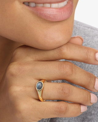 Melinda Maria She's a Boss Signet Ring Gold Labradorite. Model is wearing the ring. 