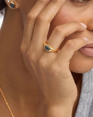 Melinda Maria She's a Boss Signet Ring Gold Labradorite. Model is wearing ring. 