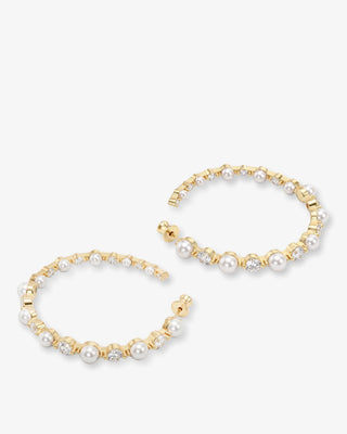 Melinda Maria She's an Icon Pearl Hoops 2". Product is shot on white background. 
