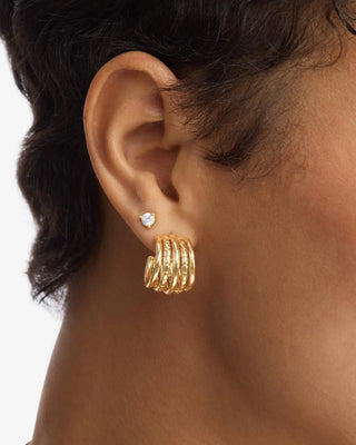 Melinda Maria Talon 5 Row Hoops. Model is wearing the earring. 