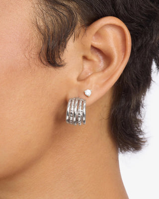 Melinda Maria Talon 5 Row Hoops. Model is wearing the earring. 