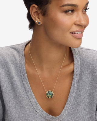 Melinda Maria Tessa Labradorite Necklace 24mm. Model is wearing the necklace. 