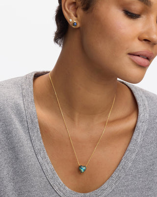 Melinda Maria The Allison Gold Labradorite Heart Necklace. Model is wearing the necklace. 