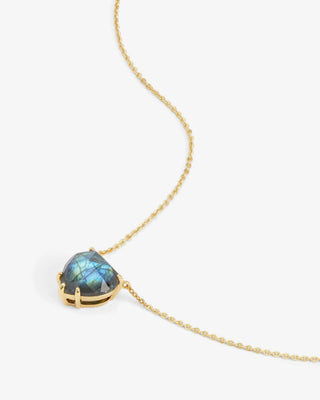 Melinda Maria The Allison Gold Labradorite Heart Necklace. Necklace is shot on white background. 