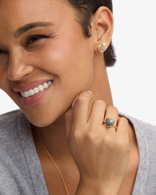 Melinda Maria The Allison Heart Ring Gold Labradorite. Model is wearing the ring. 