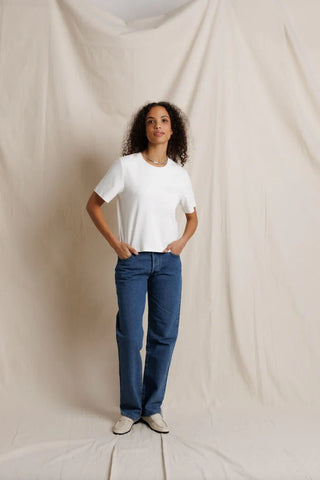 Perfect White Tee Atlas Crewneck Heavy Jersey Cotton Tee White. Model is posing in the product and image is shot on white background. 