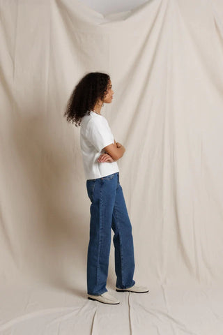 Perfect White Tee Atlas Crewneck Heavy Jersey Cotton Tee White. Model is posing in the product and image is shot on white background. 