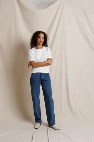 Perfect White Tee Atlas Crewneck Heavy Jersey Cotton Tee White. Model is posing in the product and image is shot on white background. 